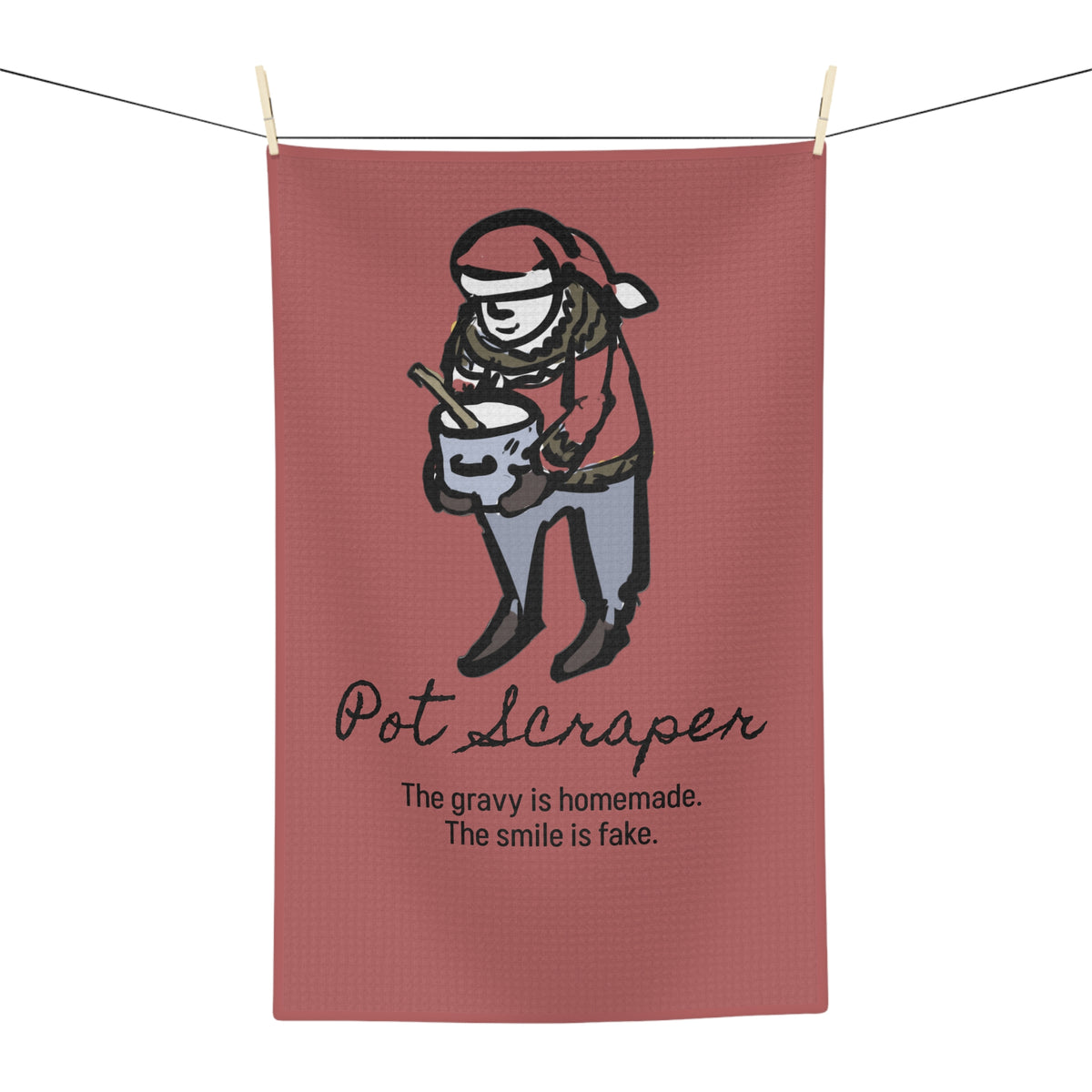 "The Gravy Is Homemade. The Smile Is Fake." Pot Scraper Yule Lad kitchen towel, art by Charlotte Guernsey, fourth view