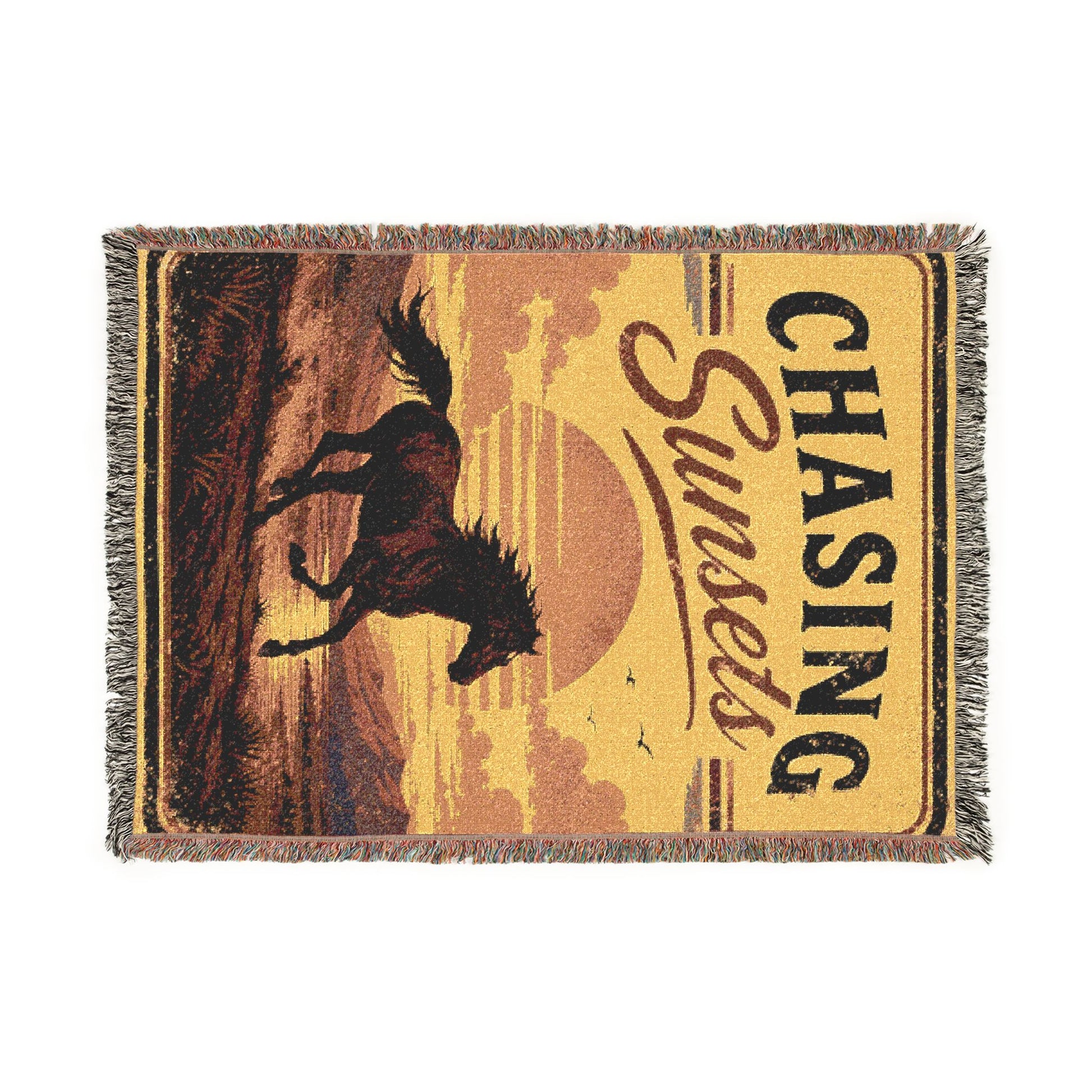 Woven tapestry throw blanket with fringed edges showing a retro horse silhouette against an orange sunset.