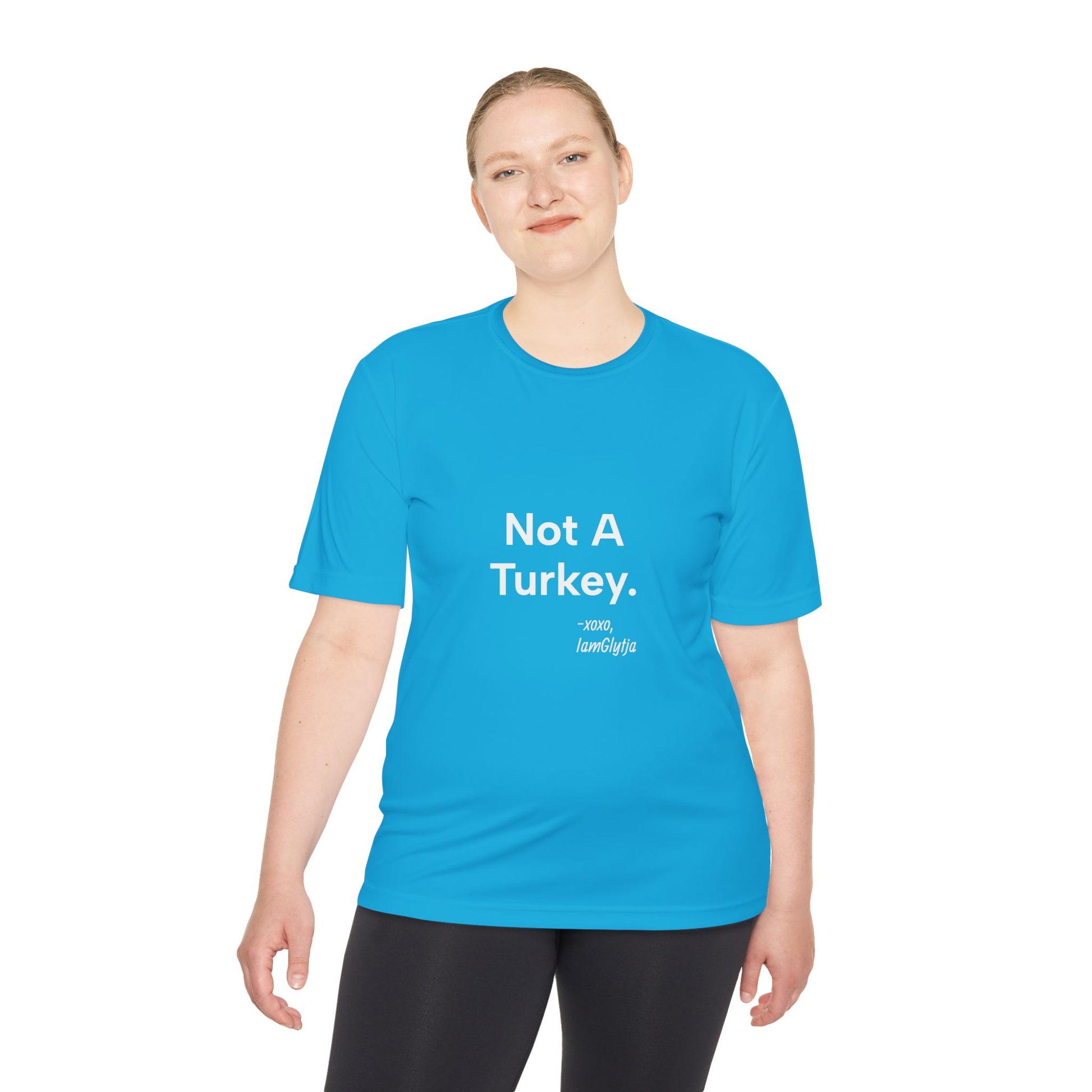 Person wearing a blue t-shirt with 'Not A Turkey' text on a white background