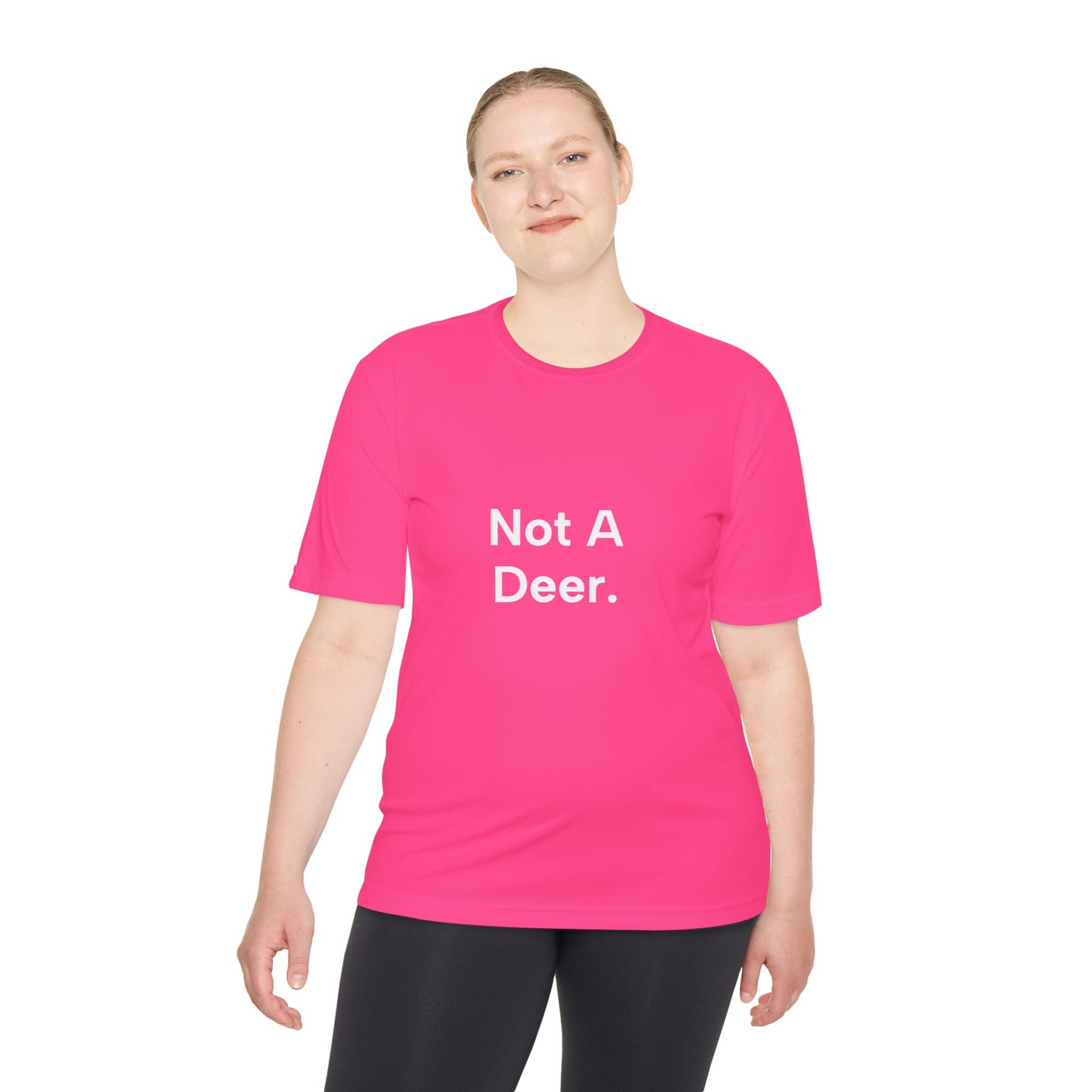 Person wearing a pink t-shirt with 'Not A Deer.' text on a white background