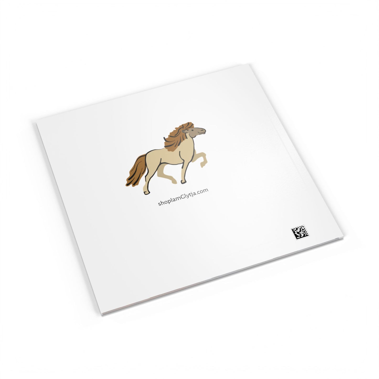 White notepad with a horse illustration on a white background