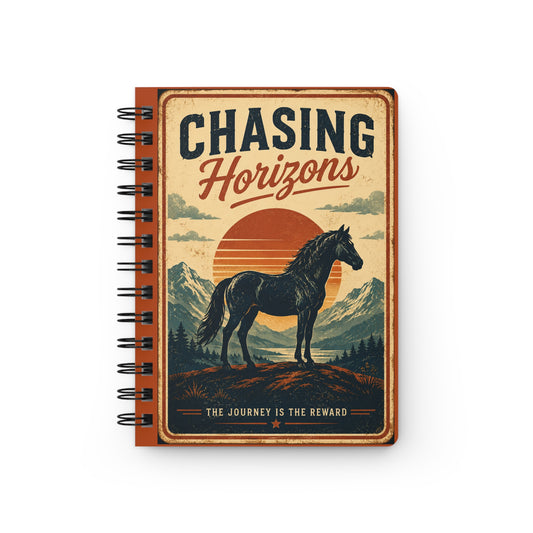 Spiral-bound journal with a lone horse silhouetted against a setting sun and distant mountains on the cover.