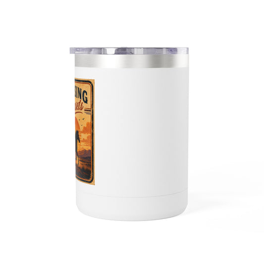 Dark grey 15oz stainless steel travel mug with a running horse against an orange sunset and the words Chasing Sunsets.