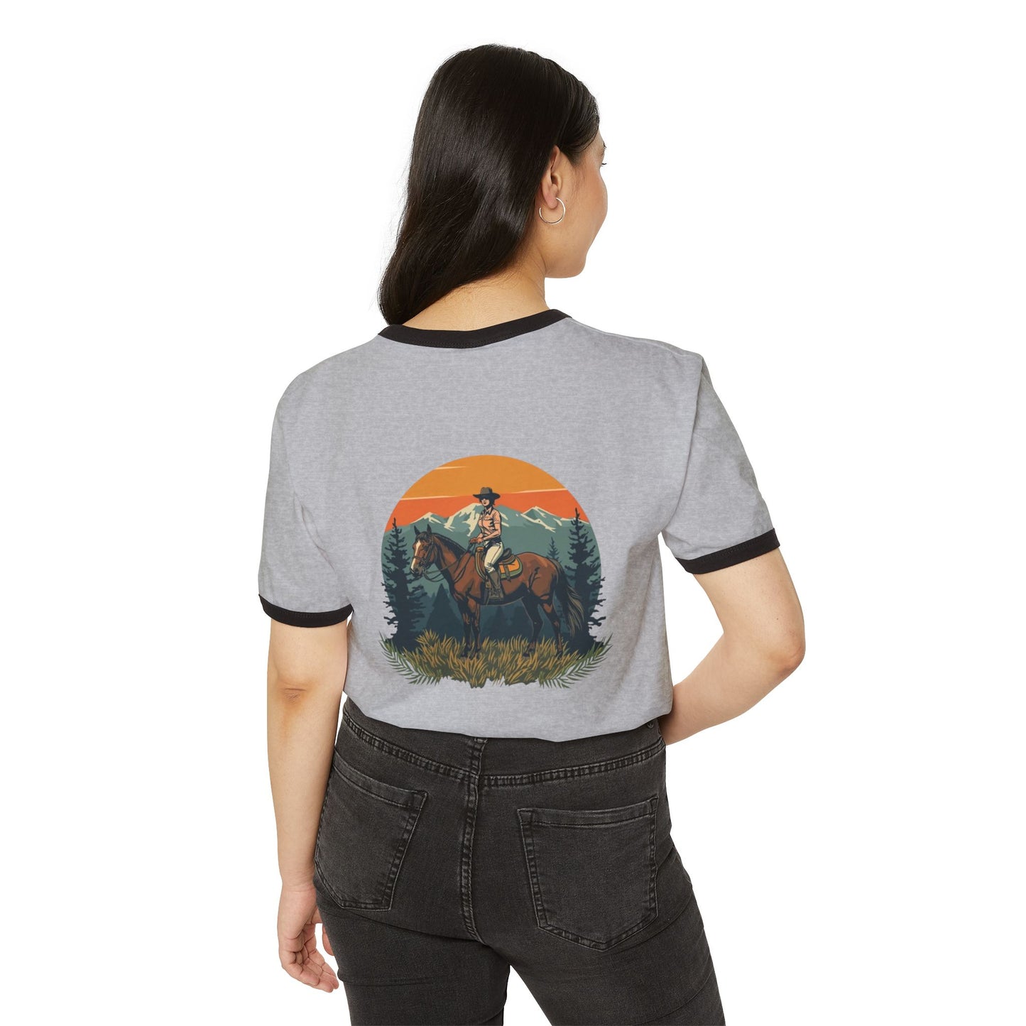 Front image:
Retro ringer tee with "Still Wild" graphic across the chest in distressed vintage print, contrast 1x1 rib binding at the collar and sleeves.
Back image:
Back of the same retro ringer tee showing a faded silhouette of a woman riding a horse, vintage tour-tee styling.