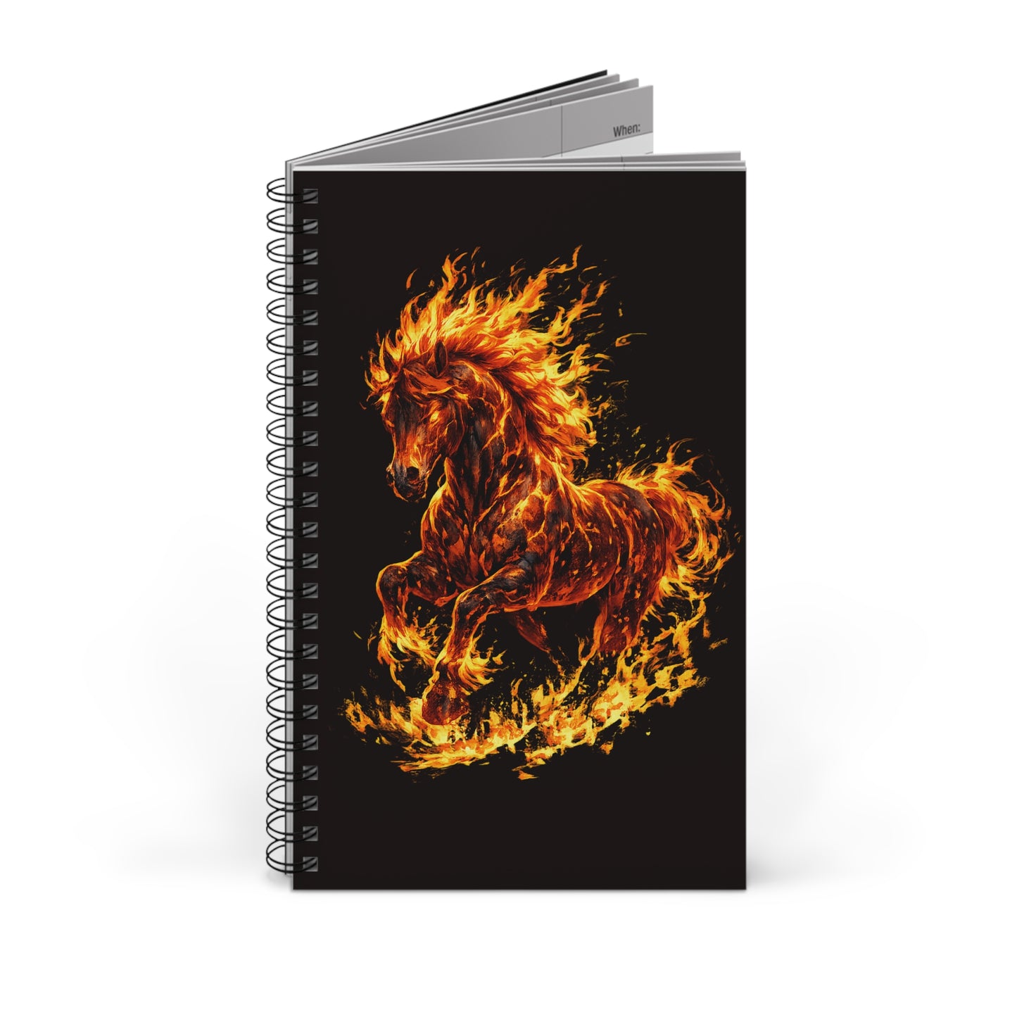 Notebook with a fiery horse design on a black background
