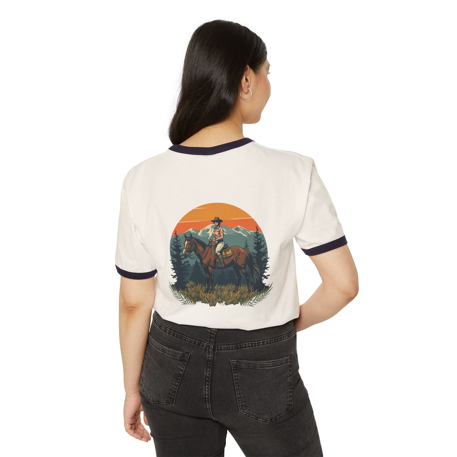 Front image:
Retro ringer tee with "Still Wild" graphic across the chest in distressed vintage print, contrast 1x1 rib binding at the collar and sleeves.
Back image:
Back of the same retro ringer tee showing a faded silhouette of a woman riding a horse, vintage tour-tee styling.