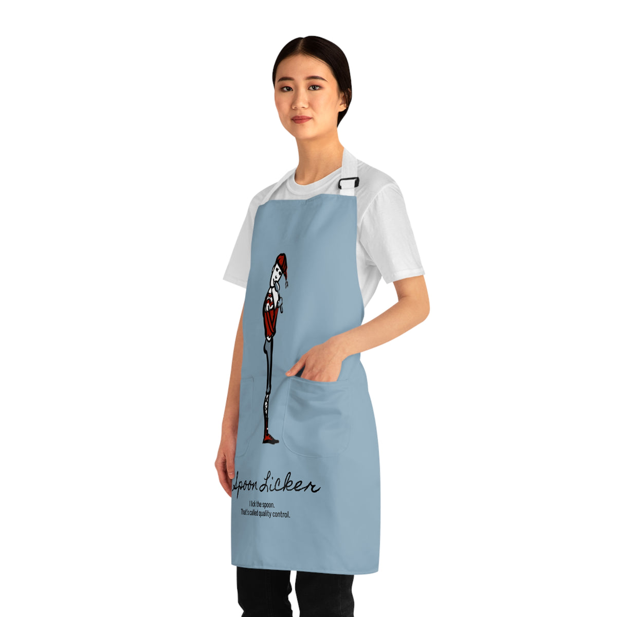 Another view of the Spoon Licker Yule Lad apron, I Lick the Spoon. That's Called Quality Control., illustrated by Charlotte Guernsey