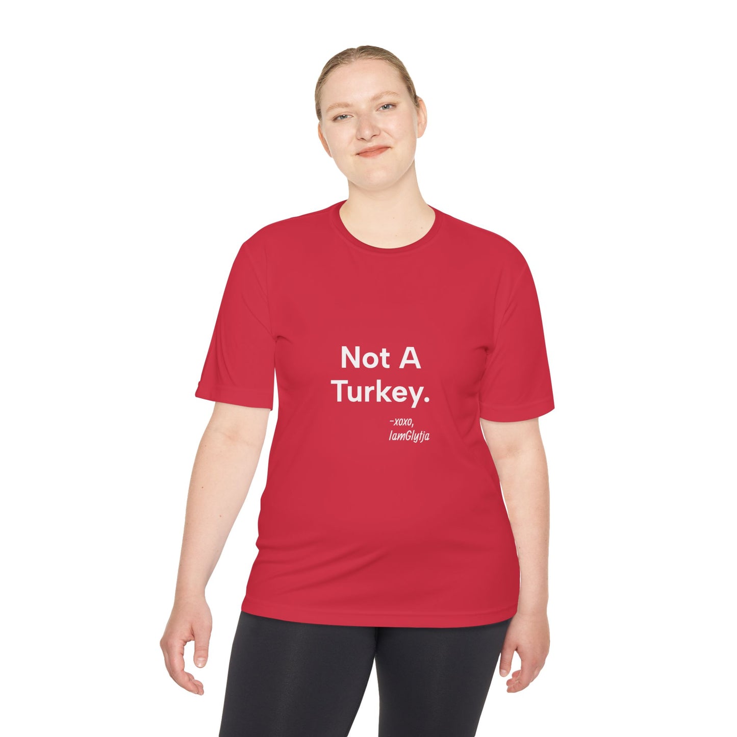 Person wearing a red t-shirt with 'Not A Turkey' text on a white background